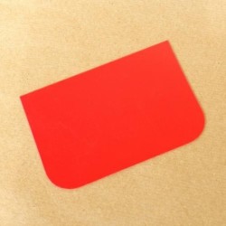 Raclette en PVC Rouge - 7,5x11,5 cmdisponible à la Maison Pollet de Toulouse